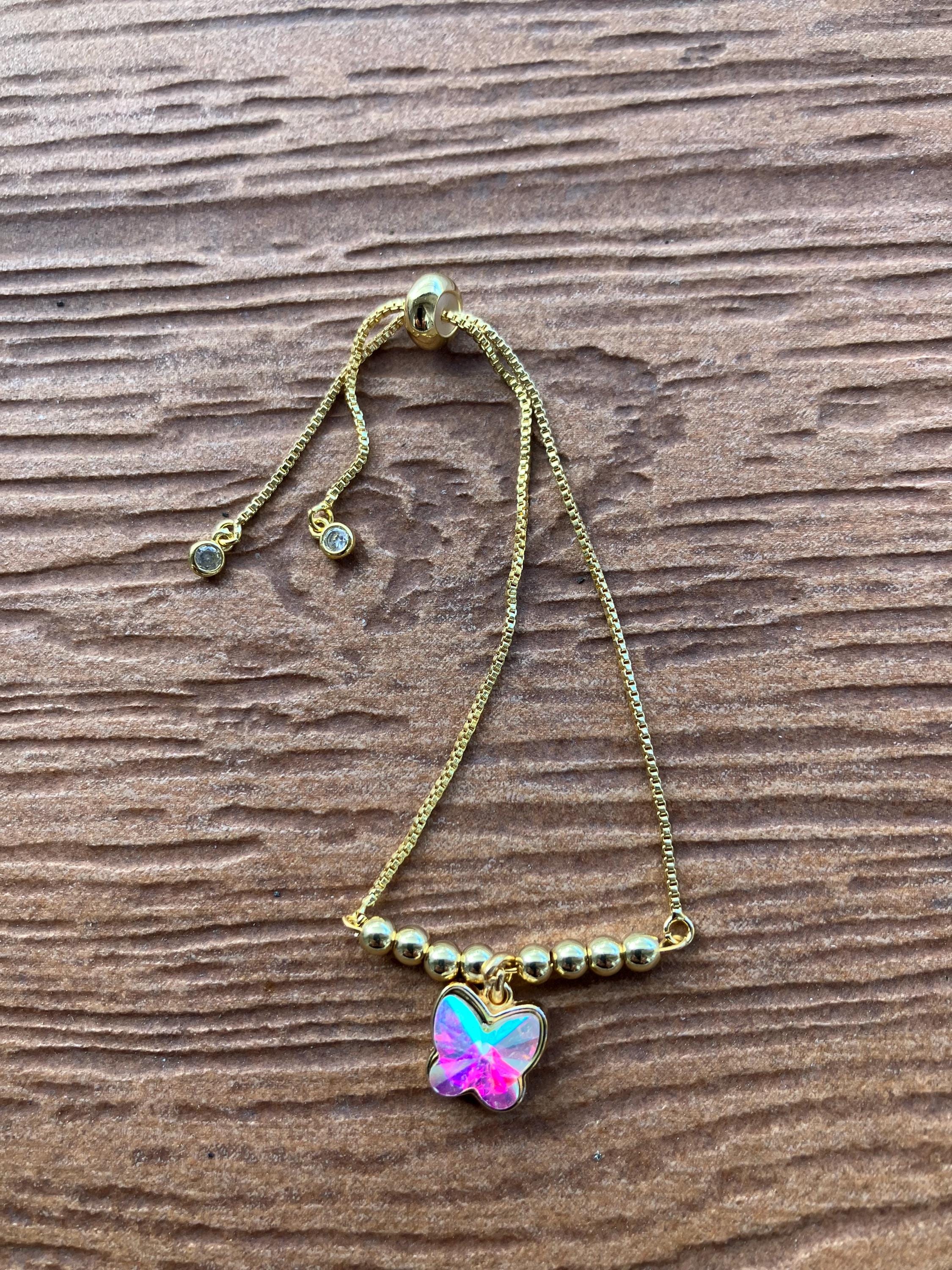 bracelet moderne chaîne coulissante en plaqué or et cristal AB aux multiples reflets