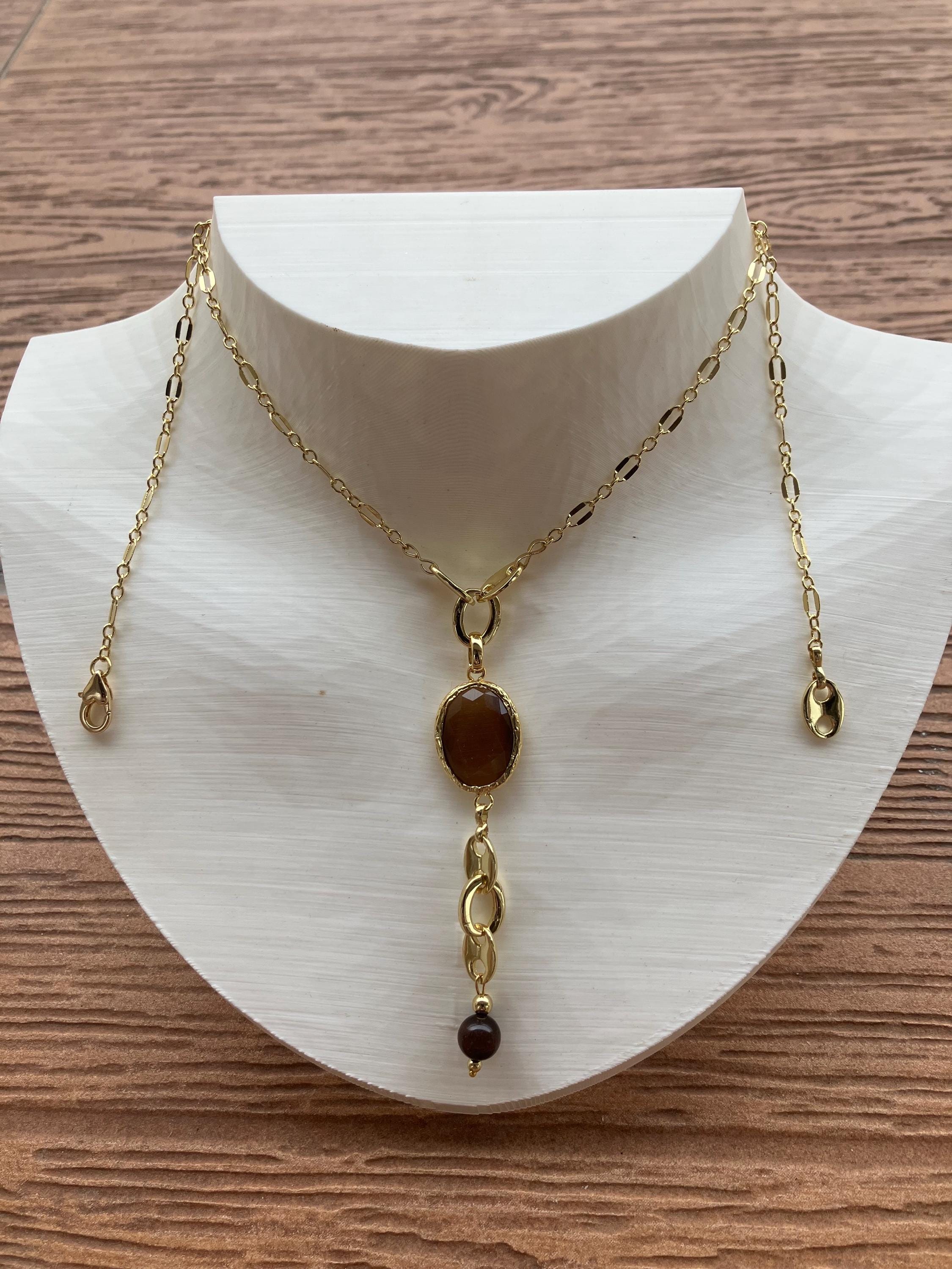 sautoir moderne chaîne torsadée en plaqué or, superbe connecteur en cristal œil de tigre dans sa lunette en plaqué or, semi précieuse