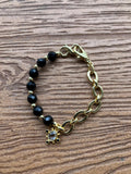 bracelet bi matière maille plaqué or et semi précieuse onyx noir facette