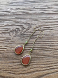 Boucles originales pendantes en plaqué or, cristal orange œil de chat cornaline et semi précieuse grenat vert