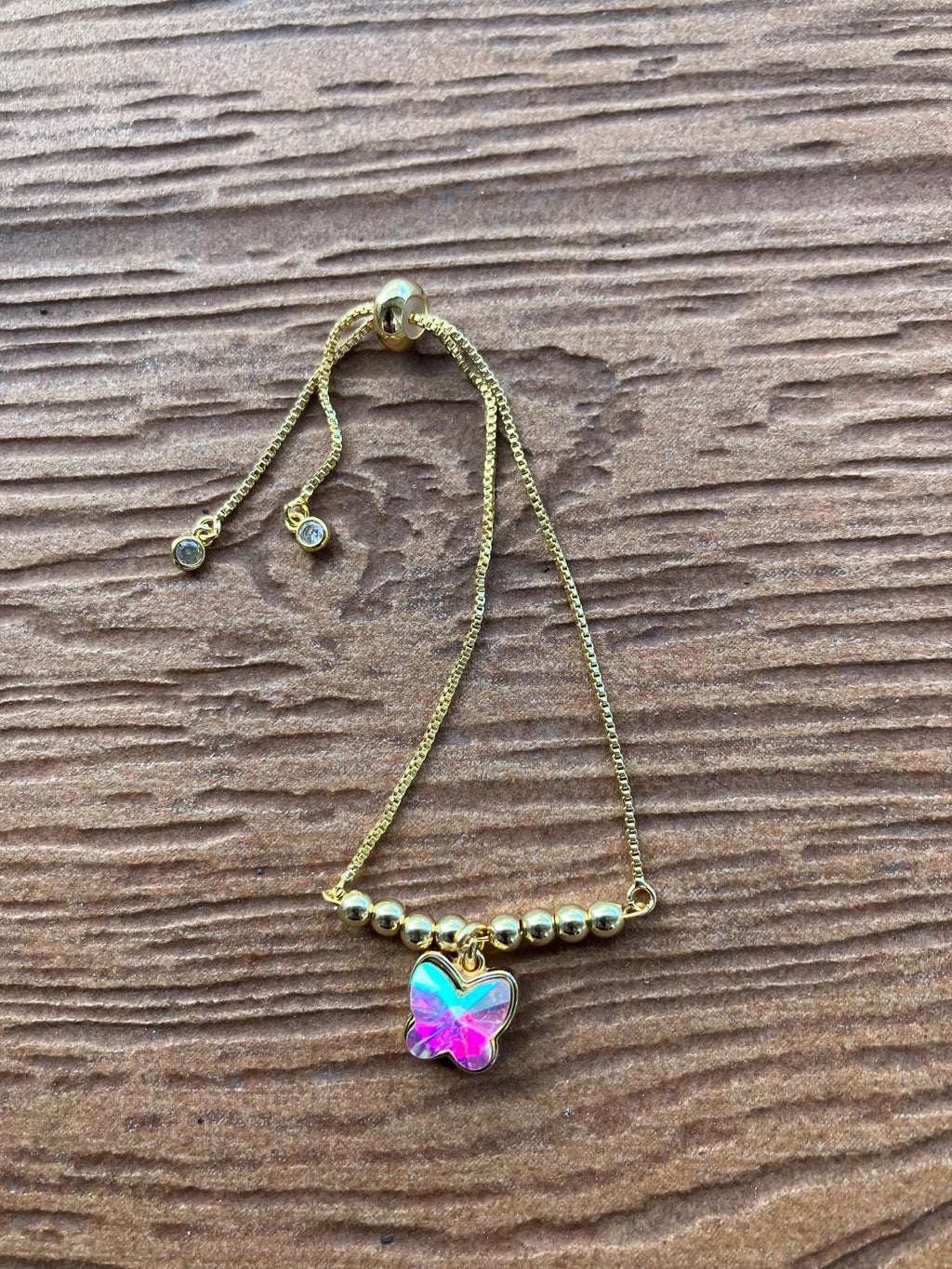 bracelet moderne chaîne coulissante en plaqué or et cristal AB aux multiples reflets