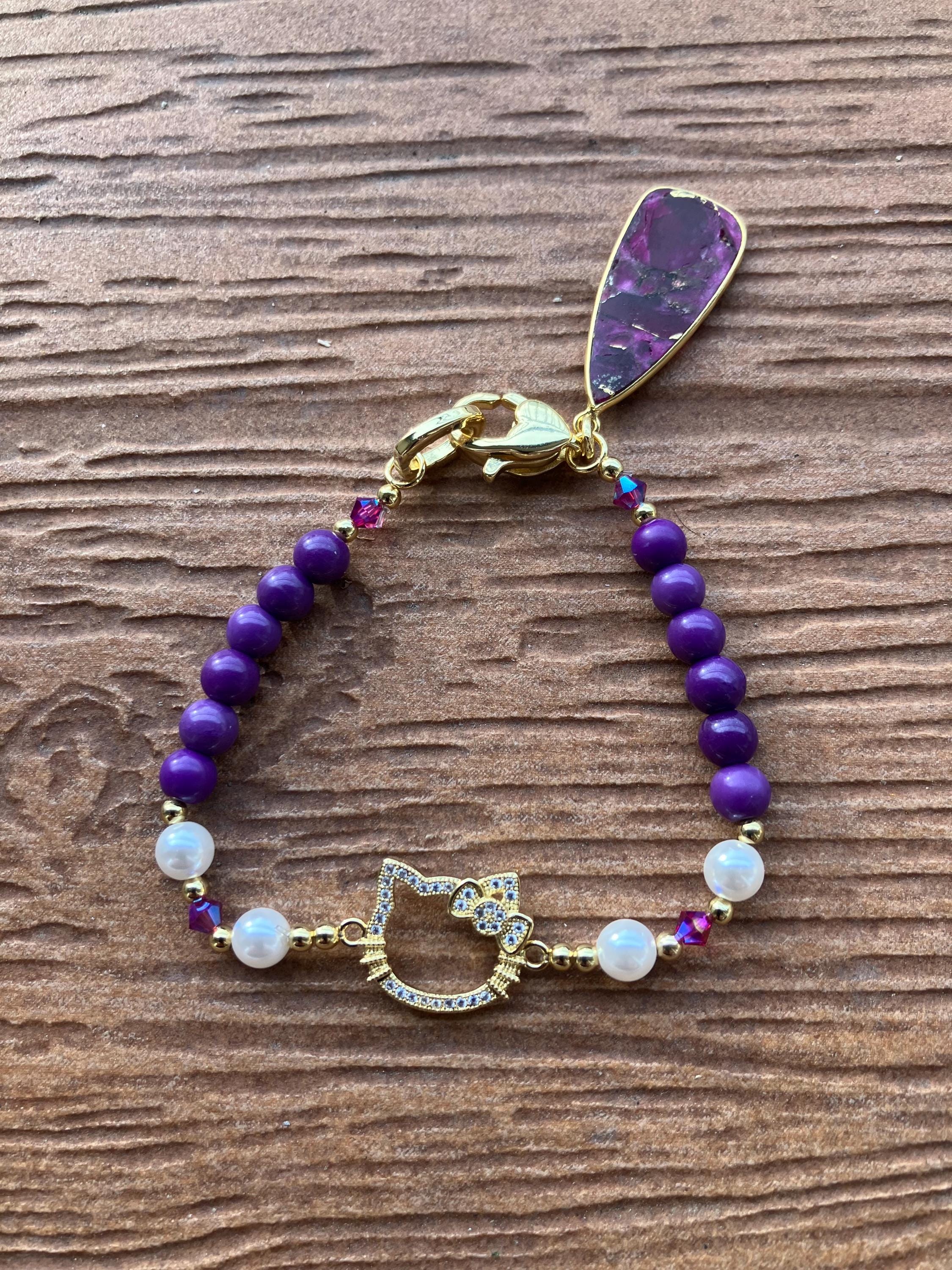 bracelet original chat en aurifie et perles semi précieuse phosphosiderite et rubis moyave, nacre et cristal Swarovski